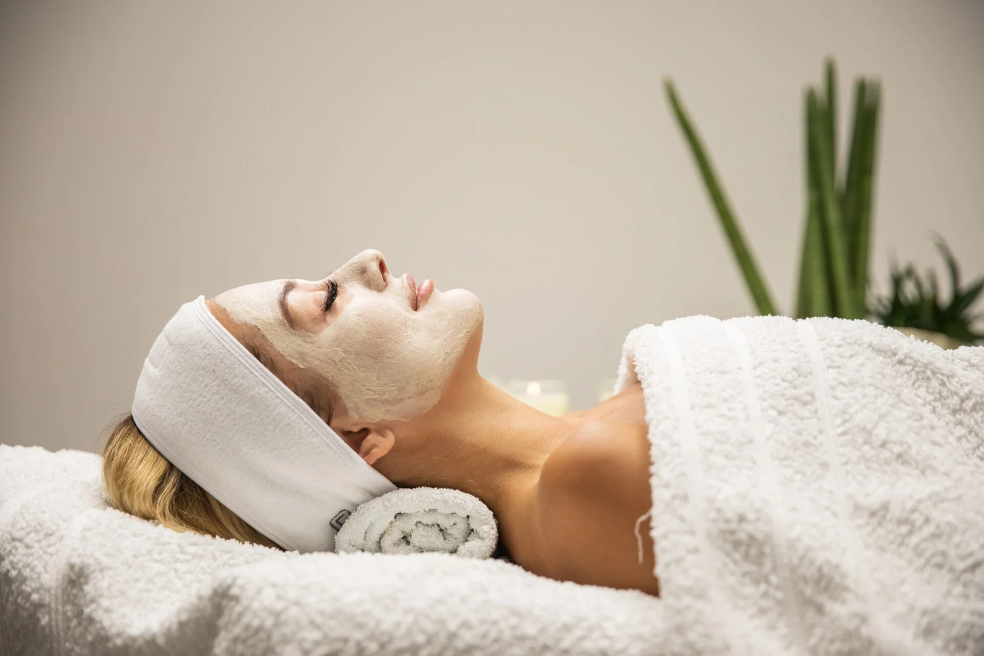 Beautiful woman with mask on face in spa beauty salon Essential facial at White N Bright Spa Thane West