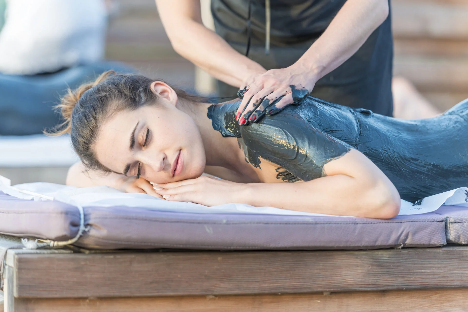 Mud massage White Radiance brightening body polish at White N Bright Spa Thane West